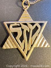 MaxSold Auction: Sterling silver necklace with David’s star pendant - Markham (Ontario, Canada) SELLER MANAGED Downsizing Online Auction - Loring Crescent