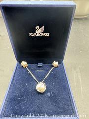 MaxSold Auction: Swarovski necklace & pendant & earrings set in box & certificate  - Markham (Ontario, Canada) SELLER MANAGED Downsizing Online Auction - Loring Crescent