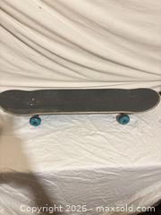 MaxSold Auction: Complete Skateboard 8.0–8.25 in Deck with Trucks & Wheels - Toronto (Ontario, Canada) SELLER MANAGED Downsizing Online Auction - Rutherford Avenue