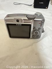 MaxSold Auction: Lot of 3 Compact Digital Cameras with Accessories - Toronto (Ontario, Canada) SELLER MANAGED Downsizing Online Auction - Rutherford Avenue