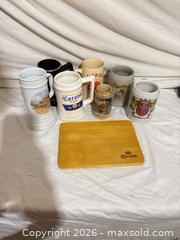 MaxSold Auction: Lot of 7 Ceramic Beer Steins & Corona Wooden Serving Board - Toronto (Ontario, Canada) SELLER MANAGED Downsizing Online Auction - Rutherford Avenue