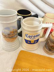 MaxSold Auction: Lot of 7 Ceramic Beer Steins & Corona Wooden Serving Board - Toronto (Ontario, Canada) SELLER MANAGED Downsizing Online Auction - Rutherford Avenue
