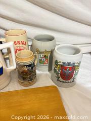 MaxSold Auction: Lot of 7 Ceramic Beer Steins & Corona Wooden Serving Board - Toronto (Ontario, Canada) SELLER MANAGED Downsizing Online Auction - Rutherford Avenue