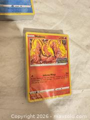 MaxSold Auction: Pokémon Trading Cards Lot — 400 Cards, Multiple Sets, build and battle Decks - Toronto (Ontario, Canada) SELLER MANAGED Downsizing Online Auction - Rutherford Avenue