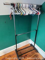 MaxSold Auction: Clothing rack with hangers  - Almonte (Ontario, Canada) SELLER MANAGED Downsizing Online Auction - River Road