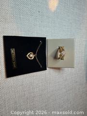 MaxSold Auction: G.E.P reversible ring & 14k Gold tone Necklace  -Lot 55 - Almonte (Ontario, Canada) SELLER MANAGED Downsizing Online Auction - River Road