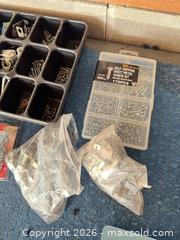 MaxSold Auction: Large hardware lot with two storage shelves, screws, bolts, washers and much more  - Almonte (Ontario, Canada) SELLER MANAGED Downsizing Online Auction - River Road