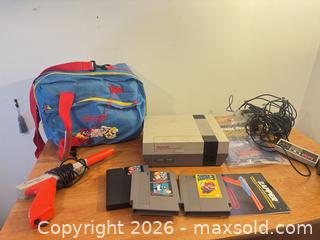 MaxSold Auction: Nintendo entertainment system with Mario games, Mario travel bag, controllers  - Almonte (Ontario, Canada) SELLER MANAGED Downsizing Online Auction - River Road