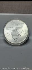 MaxSold Auction: Silver 1976 Montreal Olympic 5 dollar Coin - Canada Map Lot 23 - Almonte (Ontario, Canada) SELLER MANAGED Downsizing Online Auction - River Road