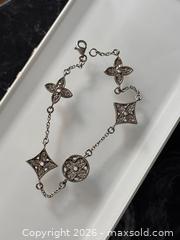 MaxSold Auction: Sterling Silver 925 Floral Chain Bracelet with Clear CZ Crystals - Pickering (Ontario, Canada) PARTNER MANAGED Estate Sale Online Auction - Granite Court