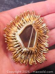 MaxSold Auction: Stunning Vintage Gold Finish Starburst Brooch with Amber Glass/Crystal Modernist - Pickering (Ontario, Canada) PARTNER MANAGED Estate Sale Online Auction - Granite Court