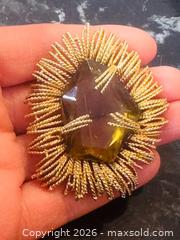 MaxSold Auction: Stunning Vintage Gold Finish Starburst Brooch with Amber Glass/Crystal Modernist - Pickering (Ontario, Canada) PARTNER MANAGED Estate Sale Online Auction - Granite Court