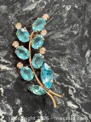 MaxSold Auction: Vintage Old 1940s Aqua Teal Floral Crystal Rhinestone Leaf Gold-Tone Open Back Brooch  - Pickering (Ontario, Canada) PARTNER MANAGED Estate Sale Online Auction - Granite Court