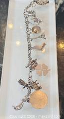 MaxSold Auction: Vintage Sterling Silver 925 Travel & Vintage Charm Bracelet Buddah - Pickering (Ontario, Canada) PARTNER MANAGED Estate Sale Online Auction - Granite Court