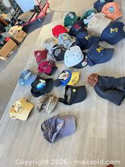 MaxSold Auction: A lot of hats - Cocoa (Florida, USA) SELLER MANAGED Estate Sale Online Auction - Broadcast Court.