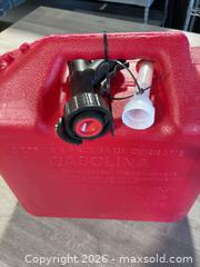 MaxSold Auction: Briggs & Stratton 5 gallon press and pour gas can - Cocoa (Florida, USA) SELLER MANAGED Estate Sale Online Auction - Broadcast Court.