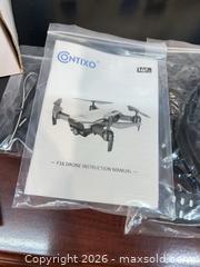 MaxSold Auction: Drone - Cocoa (Florida, USA) SELLER MANAGED Estate Sale Online Auction - Broadcast Court.