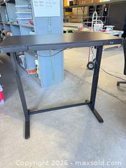 MaxSold Auction: Electric sit to stand desk - Cocoa (Florida, USA) SELLER MANAGED Estate Sale Online Auction - Broadcast Court.