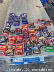 MaxSold Auction: Huge lot of diecast NASCAR - Cocoa (Florida, USA) SELLER MANAGED Estate Sale Online Auction - Broadcast Court.
