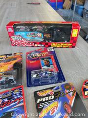 MaxSold Auction: Huge lot of diecast NASCAR - Cocoa (Florida, USA) SELLER MANAGED Estate Sale Online Auction - Broadcast Court.