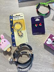 MaxSold Auction: Lot of jewelry in Crystal Lake container - Cocoa (Florida, USA) SELLER MANAGED Estate Sale Online Auction - Broadcast Court.