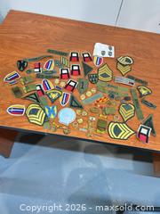MaxSold Auction: Military patches and metals - Cocoa (Florida, USA) SELLER MANAGED Estate Sale Online Auction - Broadcast Court.