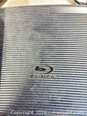 MaxSold Auction: Samsung Blu-ray disc player and multiple DVD lot - Cocoa (Florida, USA) SELLER MANAGED Estate Sale Online Auction - Broadcast Court.