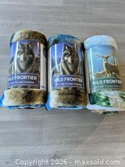 MaxSold Auction: Three wild frontier, plush throw blankets new - Cocoa (Florida, USA) SELLER MANAGED Estate Sale Online Auction - Broadcast Court.