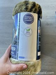 MaxSold Auction: Three wild frontier, plush throw blankets new - Cocoa (Florida, USA) SELLER MANAGED Estate Sale Online Auction - Broadcast Court.