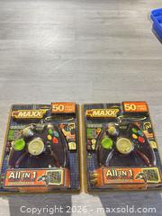 MaxSold Auction: Two new video game controllers - Cocoa (Florida, USA) SELLER MANAGED Estate Sale Online Auction - Broadcast Court.