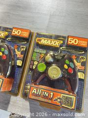 MaxSold Auction: Two new video game controllers - Cocoa (Florida, USA) SELLER MANAGED Estate Sale Online Auction - Broadcast Court.