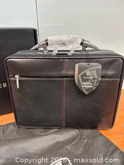 MaxSold Auction: Zeyner motoring collection laptop bag - Cocoa (Florida, USA) SELLER MANAGED Estate Sale Online Auction - Broadcast Court.