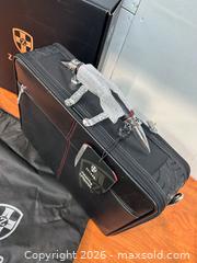 MaxSold Auction: Zeyner motoring collection laptop bag - Cocoa (Florida, USA) SELLER MANAGED Estate Sale Online Auction - Broadcast Court.