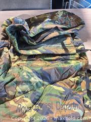 MaxSold Auction: Zip up military camo like blanket - Cocoa (Florida, USA) SELLER MANAGED Estate Sale Online Auction - Broadcast Court.