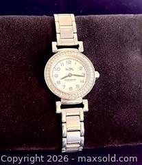 MaxSold Auction: Coach Ladies Watch  - Blandford-Blenheim (Ontario, Canada) SELLER MANAGED Downsizing Online Auction -  Harmer Crescent