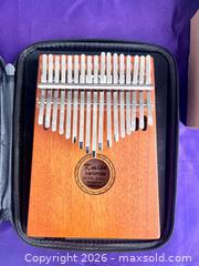 MaxSold Auction: Ocarina of Time & Kalimba Instruments  - Blandford-Blenheim (Ontario, Canada) SELLER MANAGED Downsizing Online Auction -  Harmer Crescent