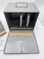 MaxSold Auction: 8mm Film Storage Cases and 4 Reels  - Bremerton (Washington, USA) SELLER MANAGED Estate Sale Online Auction - Burwell Street