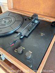 MaxSold Auction: Crosley CR49 Portable Suitcase Turntable / Record Player A - Ottawa (Ontario, Canada) PARTNER MANAGED Downsizing Online Auction - Carling Avenue (CONDO)