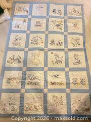 MaxSold Auction: Embroidered Patchwork Baby/Crib Quilt — about 40 x 56 in - Ottawa (Ontario, Canada) PARTNER MANAGED Downsizing Online Auction - Carling Avenue (CONDO)