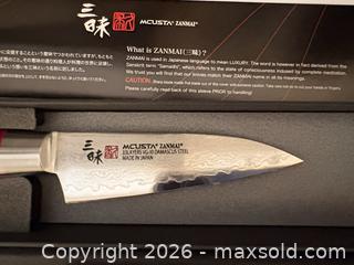 MaxSold Auction: Mcusta Zanmai 8" Cutting Utensil — 33-Layer VG-10 Damascus, Red Pakkawood A - Ottawa (Ontario, Canada) PARTNER MANAGED Downsizing Online Auction - Carling Avenue (CONDO)