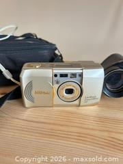 MaxSold Auction: Nikon LiteTouch Zoom 120 ED AF 35mm Camera + Binoculars A - Ottawa (Ontario, Canada) PARTNER MANAGED Downsizing Online Auction - Carling Avenue (CONDO)