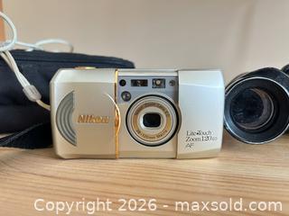 MaxSold Auction: Nikon LiteTouch Zoom 120 ED AF 35mm Camera + Binoculars A - Ottawa (Ontario, Canada) PARTNER MANAGED Downsizing Online Auction - Carling Avenue (CONDO)