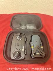 MaxSold Auction: Emolion E88 4K RC Drone Foldable Quadcopter 2.4G R/C Quadrotor With Case, BLACK  - Glendale (Arizona, USA) SELLER MANAGED Reseller Online Auction - Bell Road (CONDO)