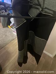 MaxSold Auction: Las Vegas Raiders Poncho Logo Embroidered OS Black/Gray Fringe Open Sides NFL - Glendale (Arizona, USA) SELLER MANAGED Reseller Online Auction - Bell Road (CONDO)