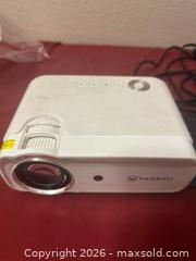 MaxSold Auction: VANKYO Leisure D30 Portable Movie Projector with Built-in Speaker, 236" Display - Glendale (Arizona, USA) SELLER MANAGED Reseller Online Auction - Bell Road (CONDO)