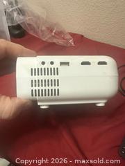 MaxSold Auction: VANKYO Leisure D30 Portable Movie Projector with Built-in Speaker, 236" Display - Glendale (Arizona, USA) SELLER MANAGED Reseller Online Auction - Bell Road (CONDO)