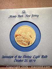 MaxSold Auction: 1 Troy Oz invention of the electric light bulb vintage Proof sterling silver coin  - Toronto (Ontario, Canada) SELLER MANAGED Downsizing Online Auction - Applefield Drive