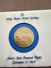 MaxSold Auction: 1 Troy Oz Man’s First Powered Flight vintage Proof sterling silver coin  - Toronto (Ontario, Canada) SELLER MANAGED Downsizing Online Auction - Applefield Drive