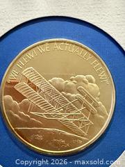 MaxSold Auction: 1 Troy Oz Man’s First Powered Flight vintage Proof sterling silver coin  - Toronto (Ontario, Canada) SELLER MANAGED Downsizing Online Auction - Applefield Drive