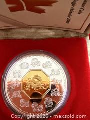 MaxSold Auction: 2000  Year Of The DRAGON Chinese Lunar Proof Silver Coin $15 ROYAL CANADIAN MINT - Toronto (Ontario, Canada) SELLER MANAGED Downsizing Online Auction - Applefield Drive